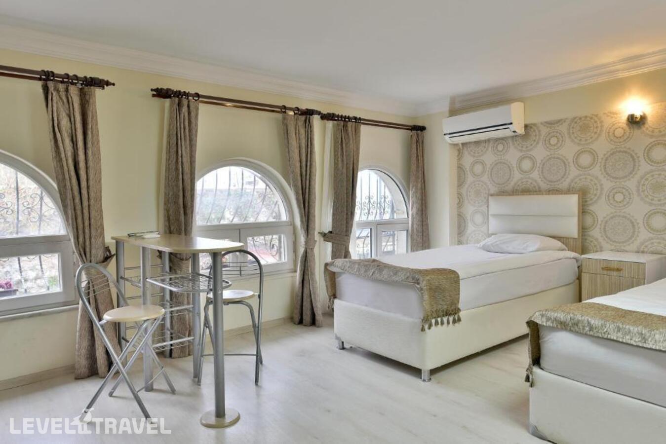 фотографии номера Стандартный номер отеля Oban Suites İstanbul в Турция(Фатих) - фото №7