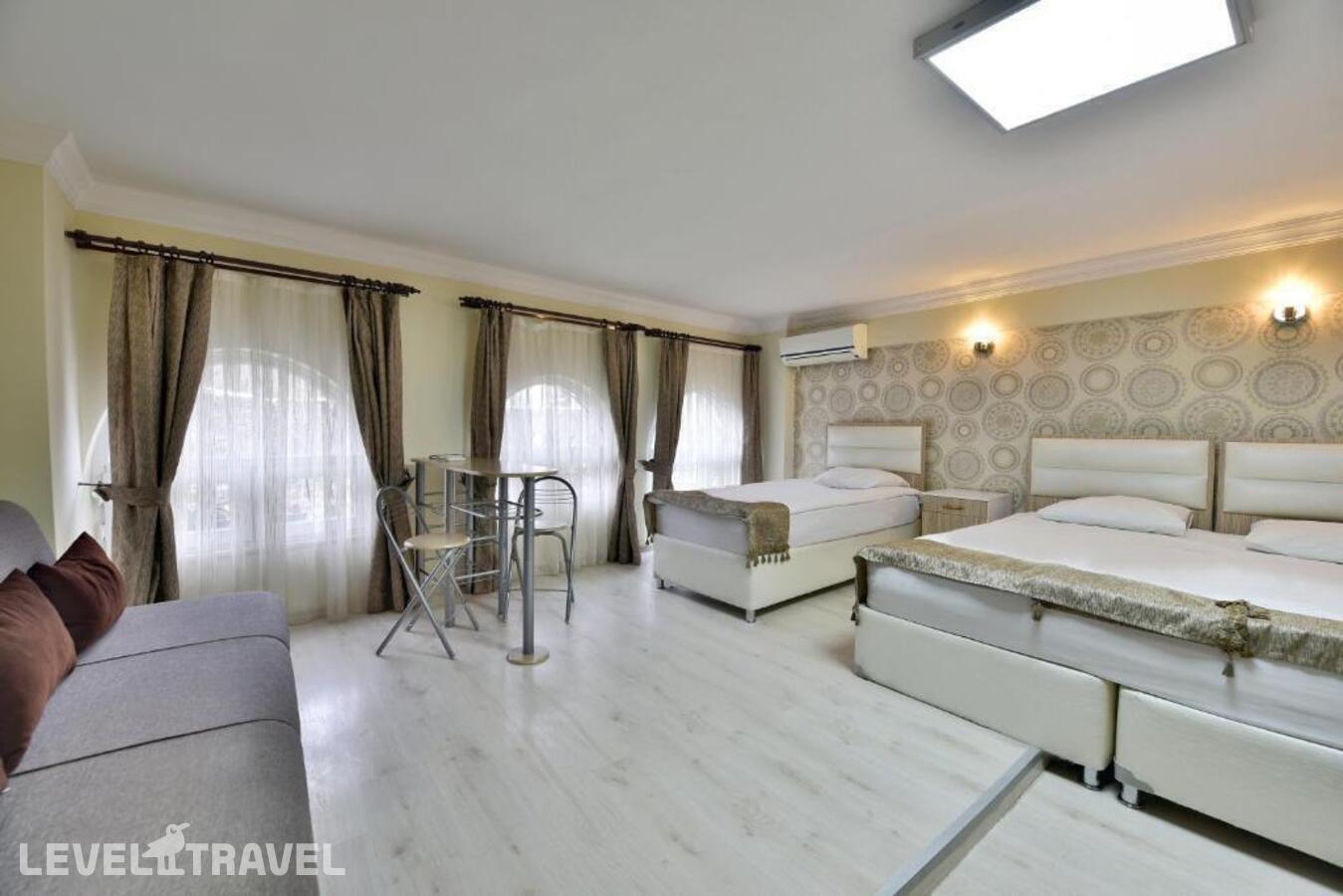 фотографии номера Стандартный номер отеля Oban Suites İstanbul в Турция(Фатих) - фото №6