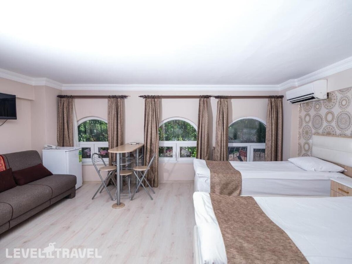 фотографии номера Четырехместный номер отеля Oban Suites İstanbul в Турция(Фатих) - фото №4