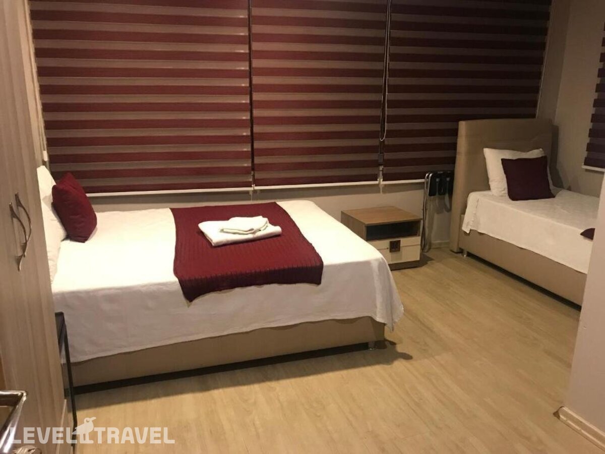 фотографии номера Семейный номер отеля Altinboynuz Family Hotel в Турция(Фатих) - фото №1