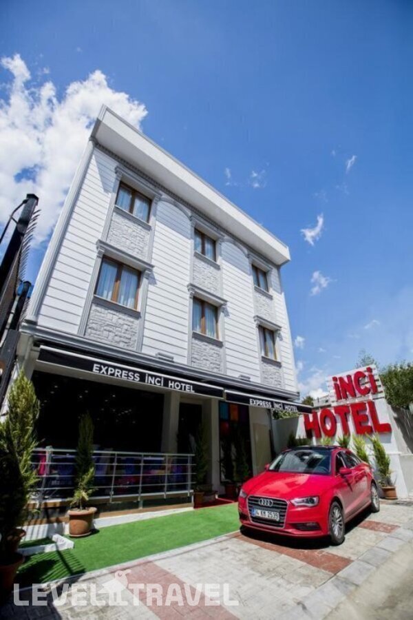 фотографии номера Четырехместный делюкс отеля Express Inci Airport Hotel в Турция(Кючюкчекмедже) - фото №11