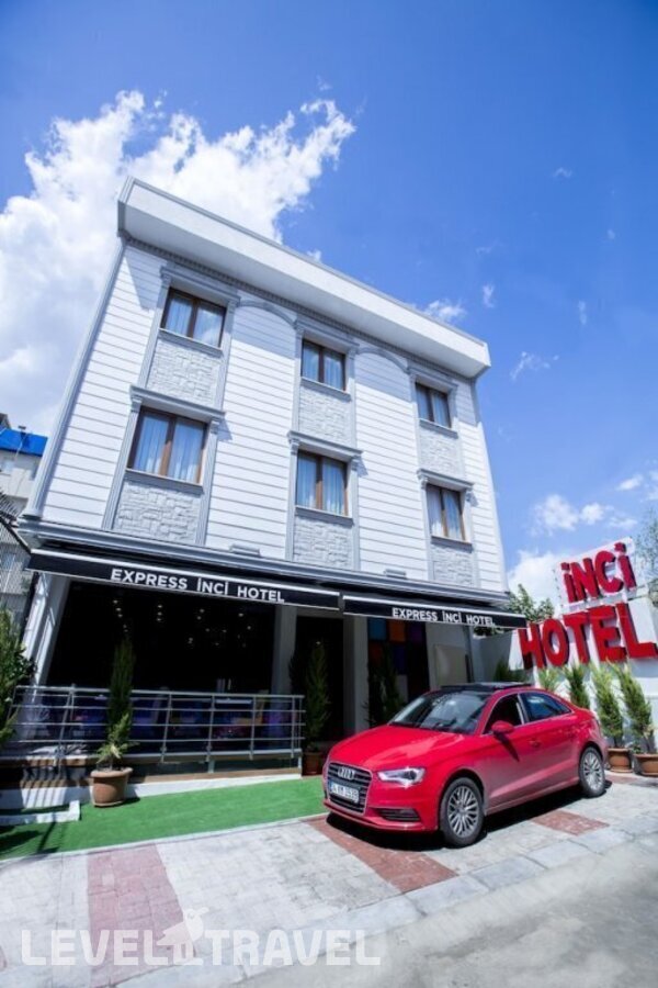 фотографии номера Четырехместный делюкс отеля Express Inci Airport Hotel в Турция(Кючюкчекмедже) - фото №7