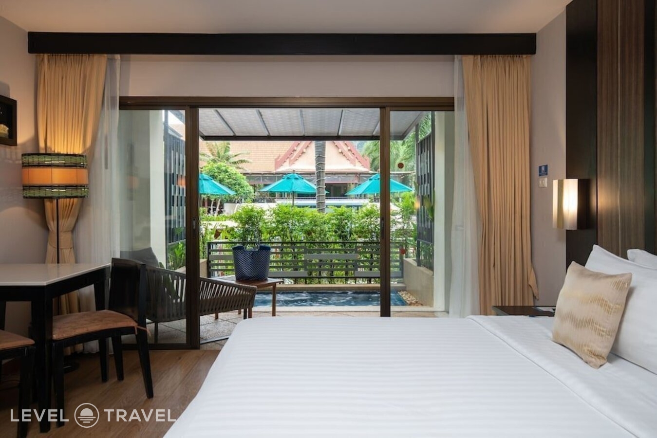 фотографии номера Делюкс с балконом отеля Deevana Patong Resort & Spa в Таиланд(Патонг Бич) - фото №56