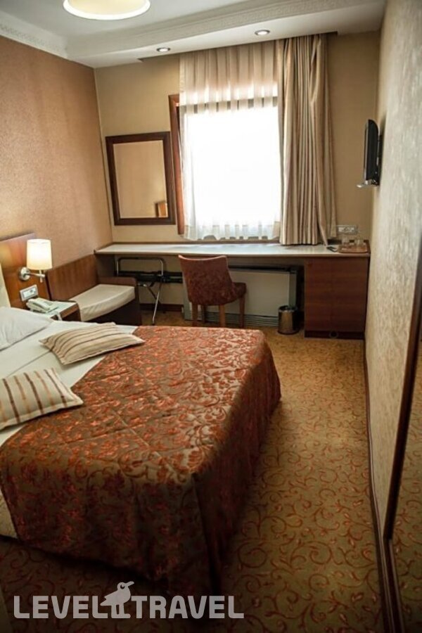 фотографии номера Стандартный номер отеля Yuksel Hotel в Турция(Фатих) - фото №3