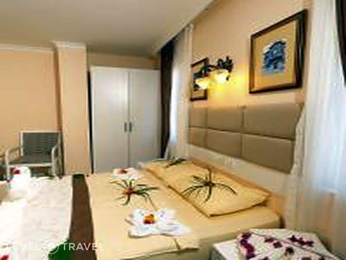 фотографии номера Четырехместный номер отеля Grand Mir Amor Hotel в Турция(Кириш) - фото №6