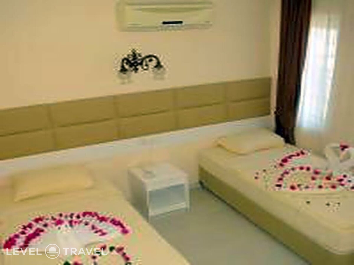 фотографии номера Четырехместный номер отеля Grand Mir Amor Hotel в Турция(Кириш) - фото №3