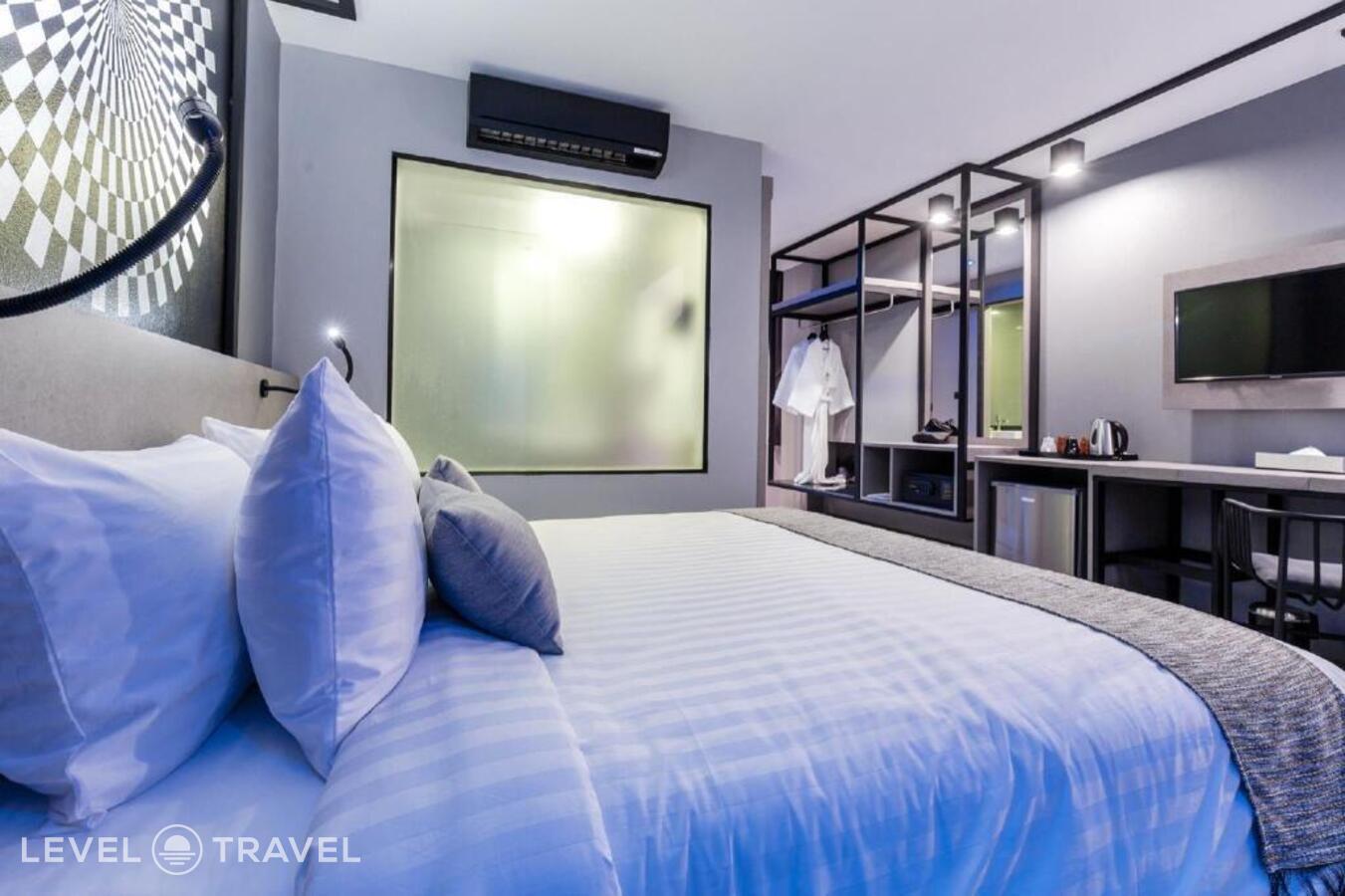 фотографии номера Делюкс с балконом отеля Mazi Design Hotel By Kalima (Ex.Patong Paradee Resort) в Таиланд(Патонг Бич) - фото №1