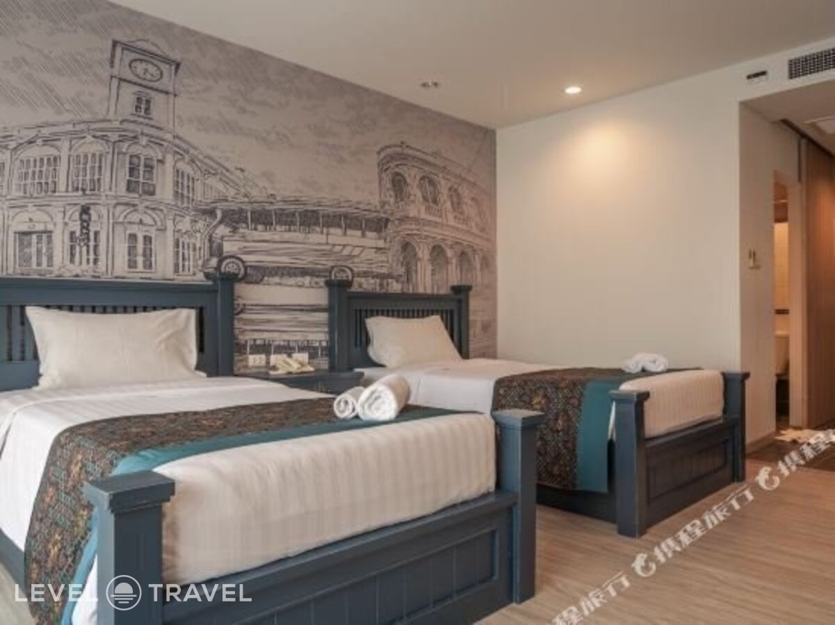фотографии номера Делюкс с балконом отеля Bhukitta Boutique Hotel в Таиланд(город Пхукет) - фото №9