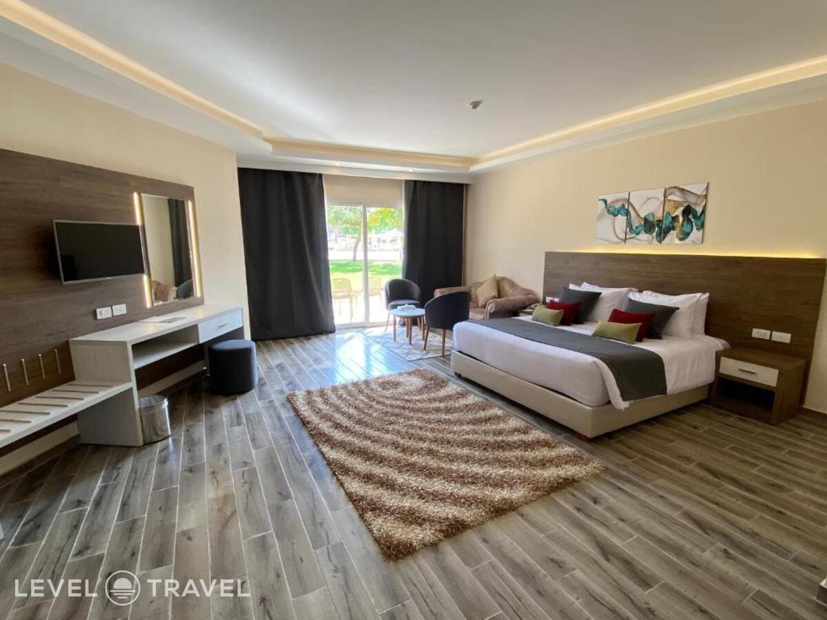 фотографии номера Делюкс с видом на бассейн отеля Amwaj Oyoun Resort & Casino в Египет(Шарм-эль-Шейх) - фото №6