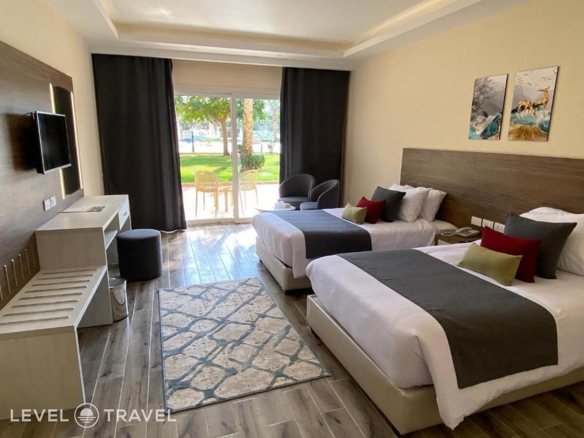 фотографии номера Делюкс с видом на бассейн отеля Amwaj Oyoun Resort & Casino в Египет(Шарм-эль-Шейх) - фото №3