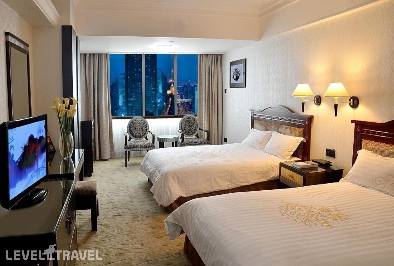 фотографии номера Делюкс отеля Canton Hotel в Китай(Гуанчжоу) - фото №3