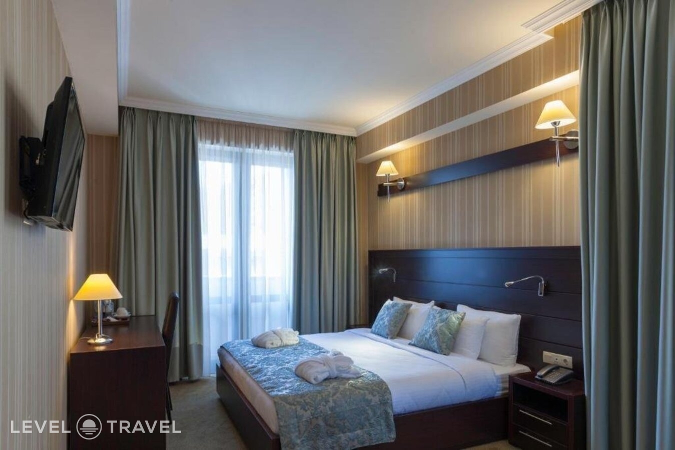 фотографии номера Семейный номер отеля Astoria Hotel Tbilisi в Грузия(Тбилиси) - фото №3