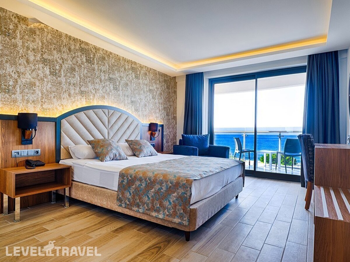 фотографии номера Стандартный с балконом отеля Grand Uysal Beach & Spa Hotel в Турция(Тосмур) - фото №1