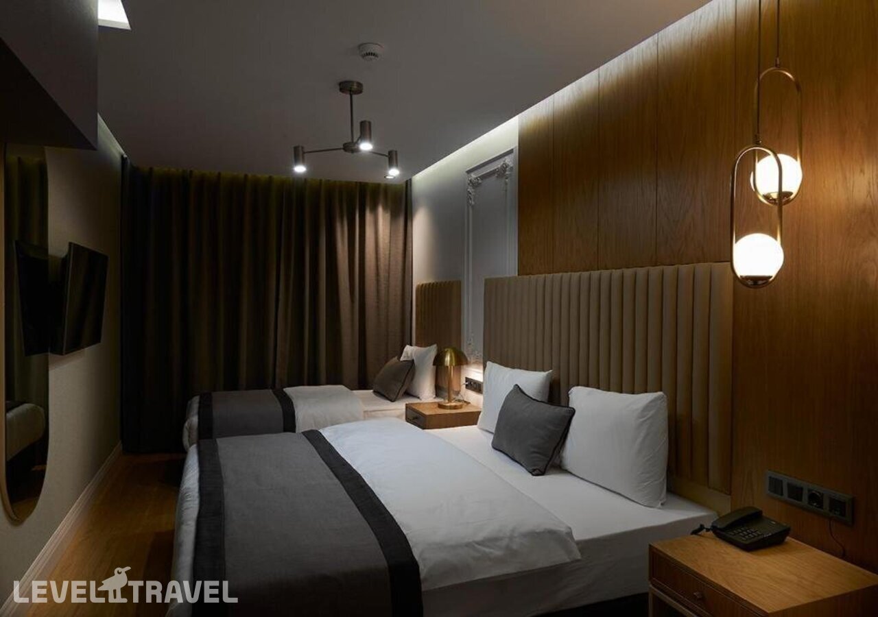 фотографии номера Трехместный улучшенный отеля Dundar Hotel (Ex. Bilinc Hotel Boutique) в Турция(Лалели) - фото №3