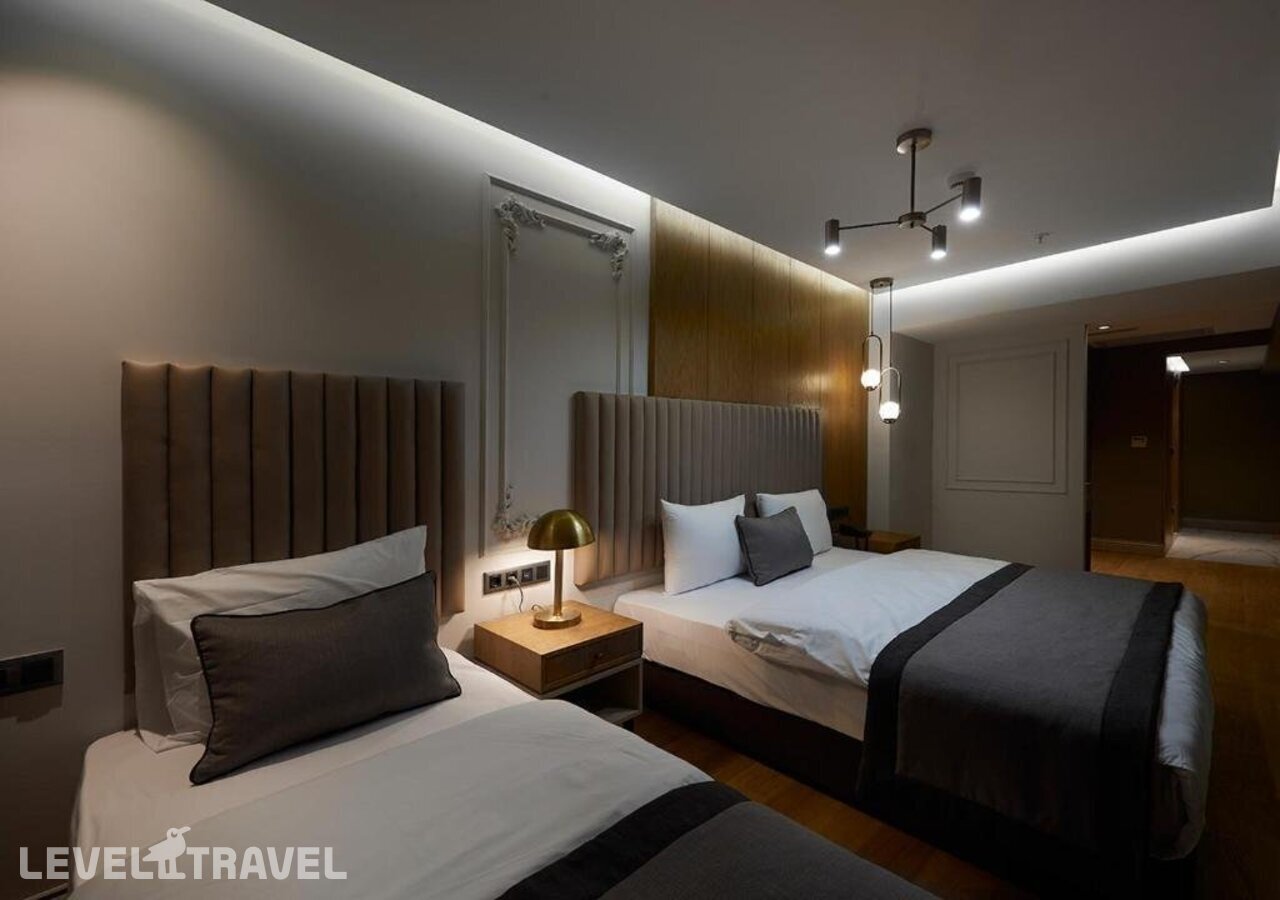 фотографии номера Трехместный улучшенный отеля Dundar Hotel (Ex. Bilinc Hotel Boutique) в Турция(Лалели) - фото №4