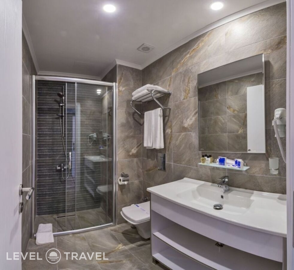 фотографии номера Трехместный улучшенный отеля Inntel Hotel Istanbul в Турция(Таксим) - фото №3