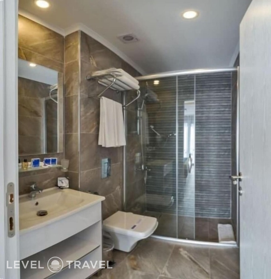 фотографии номера Трехместный улучшенный отеля Inntel Hotel Istanbul в Турция(Таксим) - фото №2