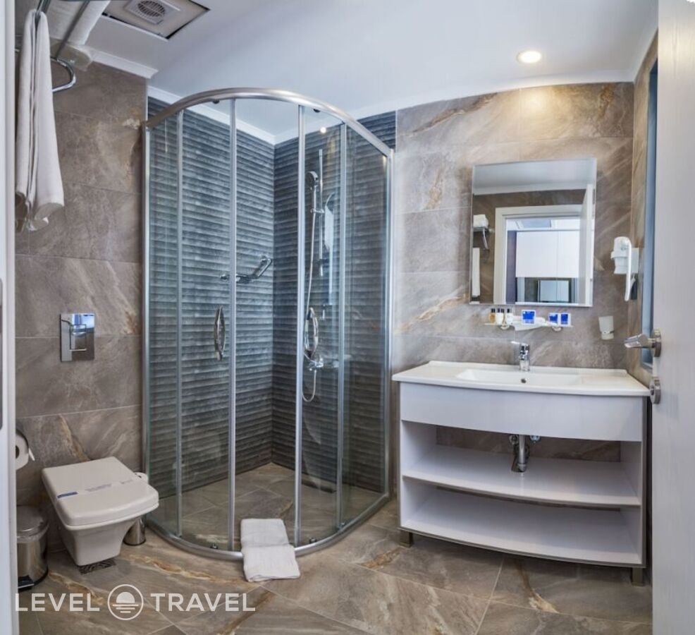 фотографии номера Трехместный улучшенный отеля Inntel Hotel Istanbul в Турция(Таксим) - фото №4