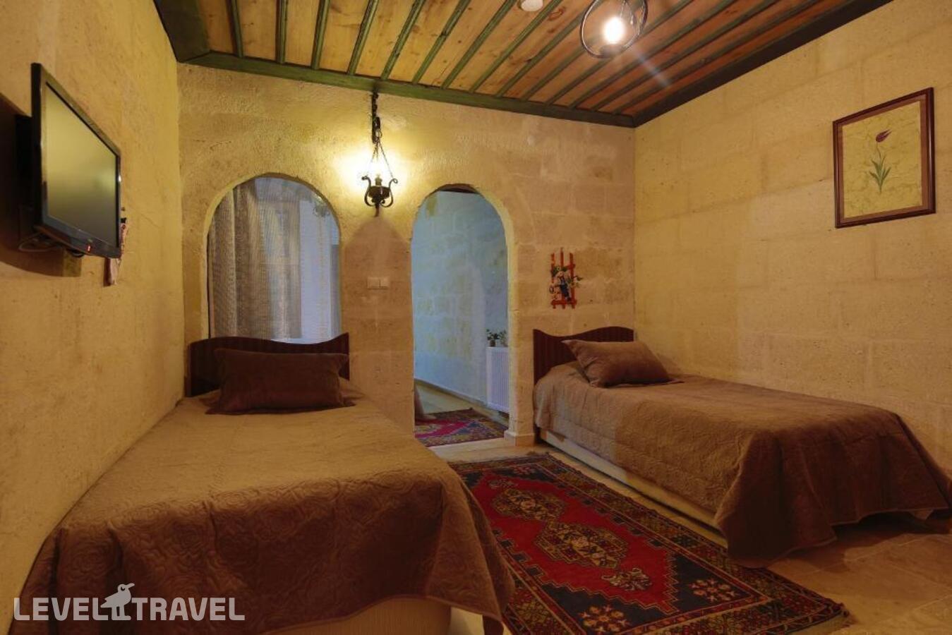 фотографии номера Семейный номер отеля Jerveni Cave Hotel в Турция(Ургюп) - фото №5