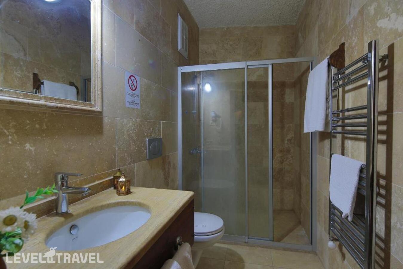 фотографии номера Семейный номер отеля Jerveni Cave Hotel в Турция(Ургюп) - фото №8