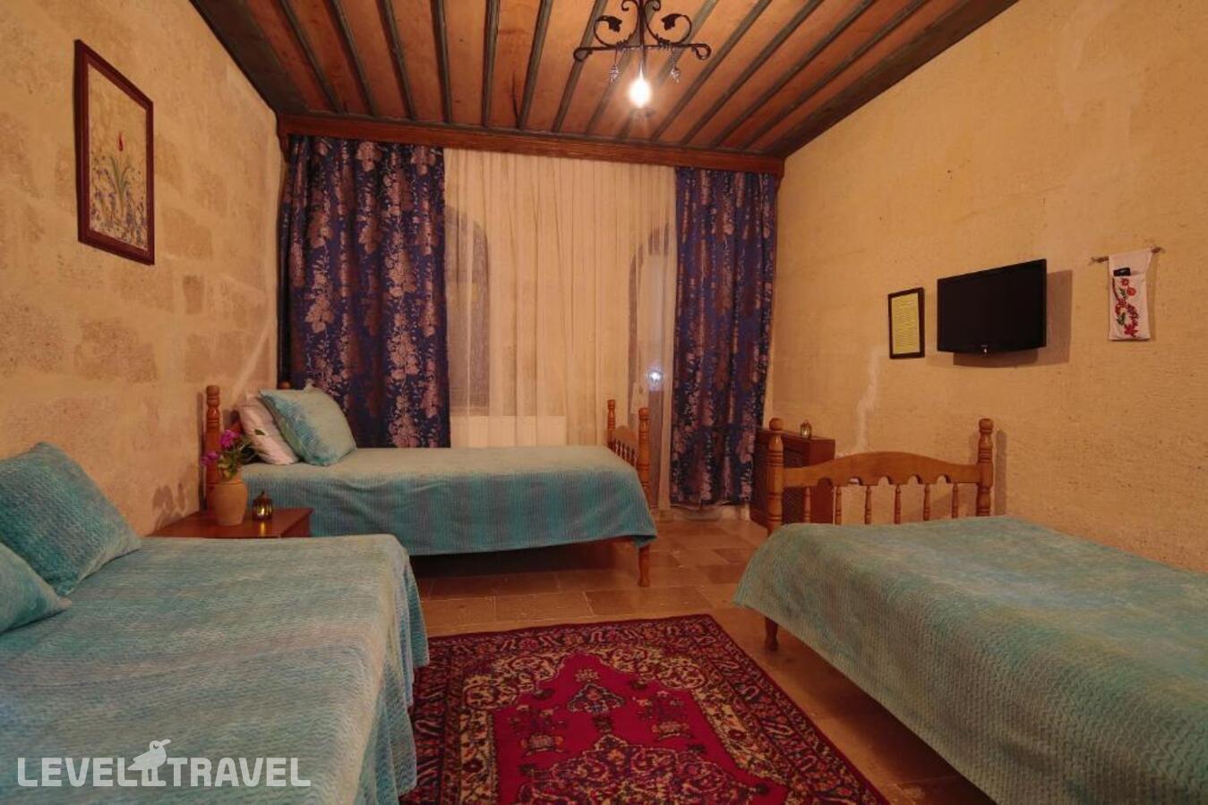 фотографии номера Семейный номер отеля Jerveni Cave Hotel в Турция(Ургюп) - фото №4