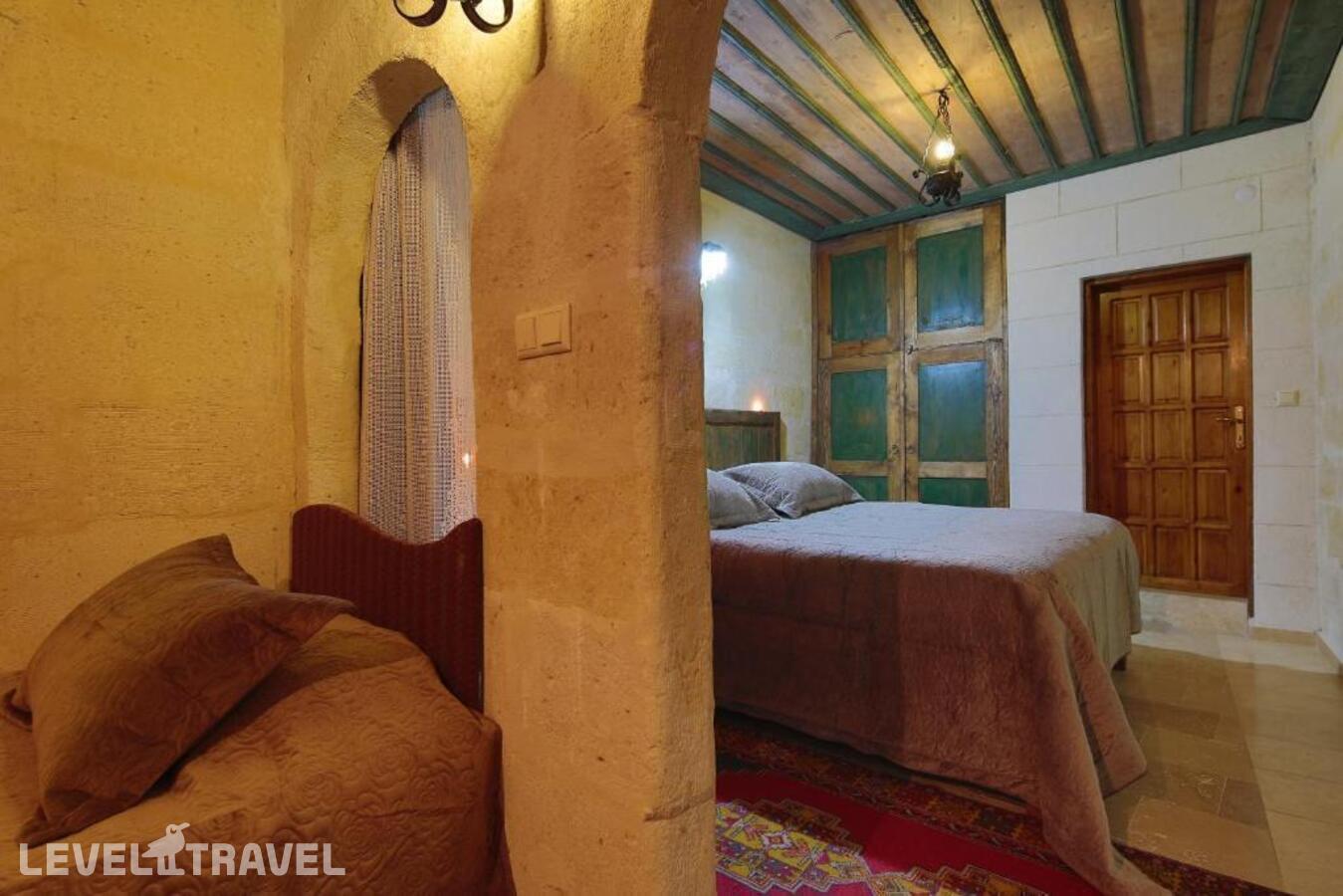 фотографии номера Семейный номер отеля Jerveni Cave Hotel в Турция(Ургюп) - фото №7