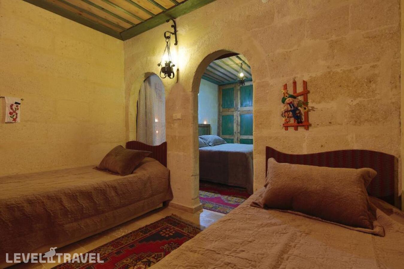 фотографии номера Семейный номер отеля Jerveni Cave Hotel в Турция(Ургюп) - фото №6