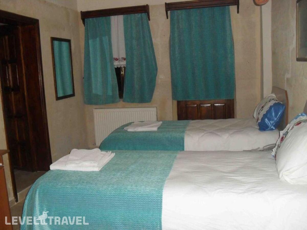фотографии номера Стандартный номер отеля Jerveni Cave Hotel в Турция(Ургюп) - фото №1