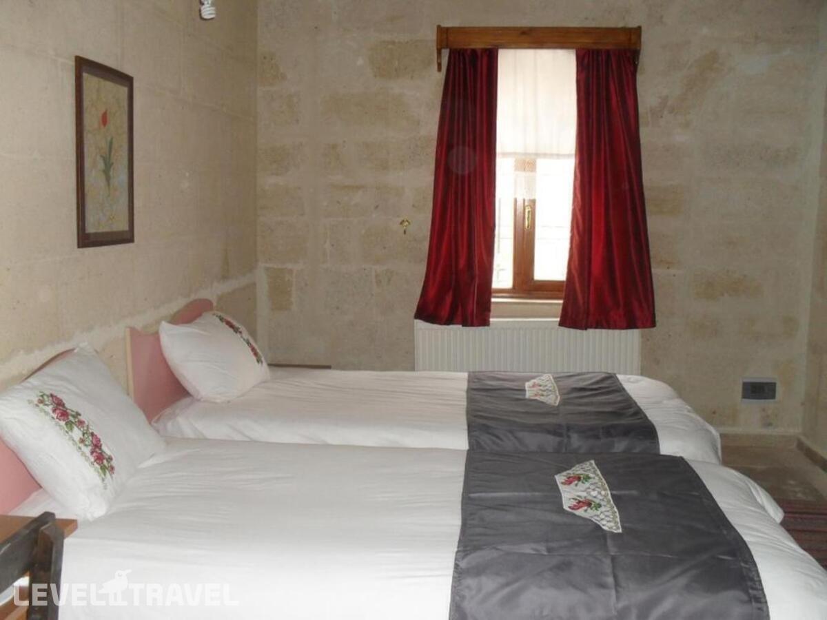 фотографии номера Стандартный номер отеля Jerveni Cave Hotel в Турция(Ургюп) - фото №2