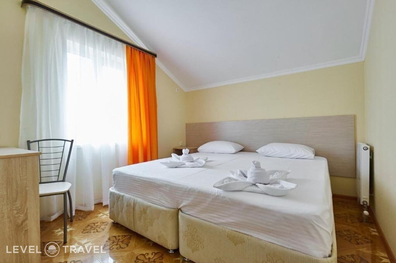 фотографии номера Семейный с балконом (2 комнаты) отеля Sirius Guest House в Россия(Адлер) - фото №1