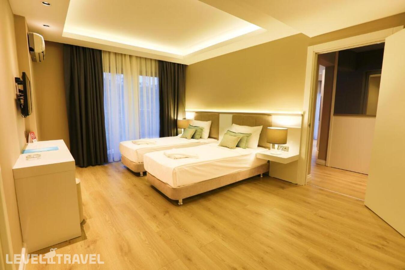 фотографии номера Семейный номер отеля Vita Bella Resort & Spa в Турция(Гюндоган) - фото №1