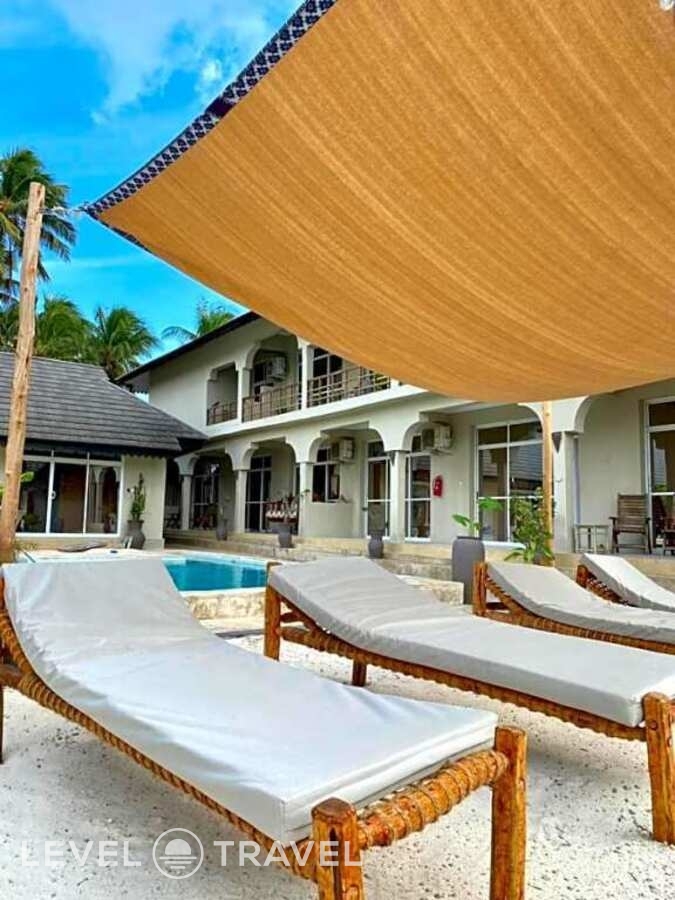 фотографии номера Трехместный номер отеля Paje Beach Apartments & Hotel в Танзания(Паже) - фото №14