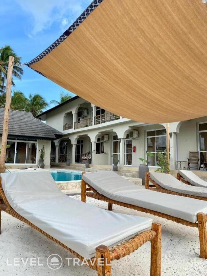 фотографии номера Трехместный номер отеля Paje Beach Apartments & Hotel в Танзания(Паже) - фото №18