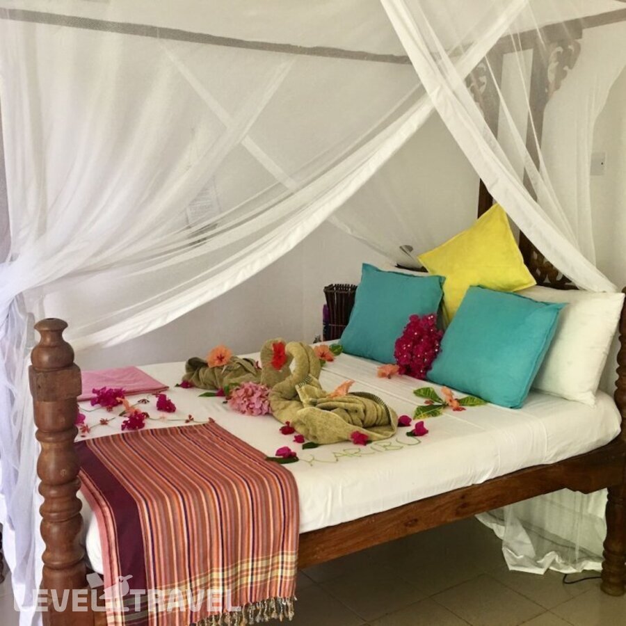 фотографии номера Стандартный номер отеля Driftwood Beach Lodge в Танзания(Джамбиани) - фото №3