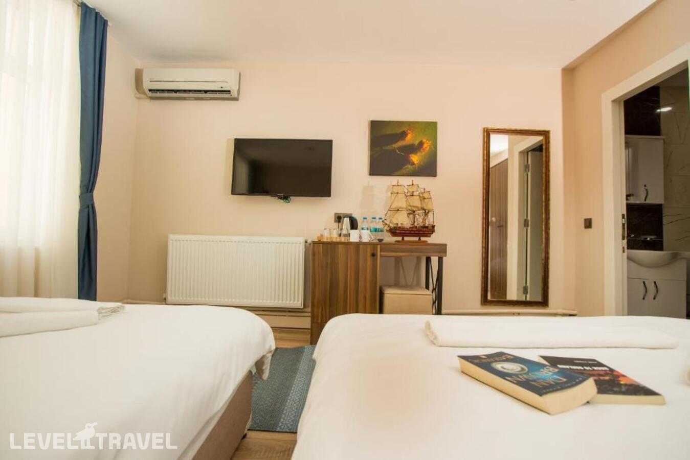 фотографии номера Четырехместный номер отеля Corner Garden Hotel в Турция(Бейоглу) - фото №4