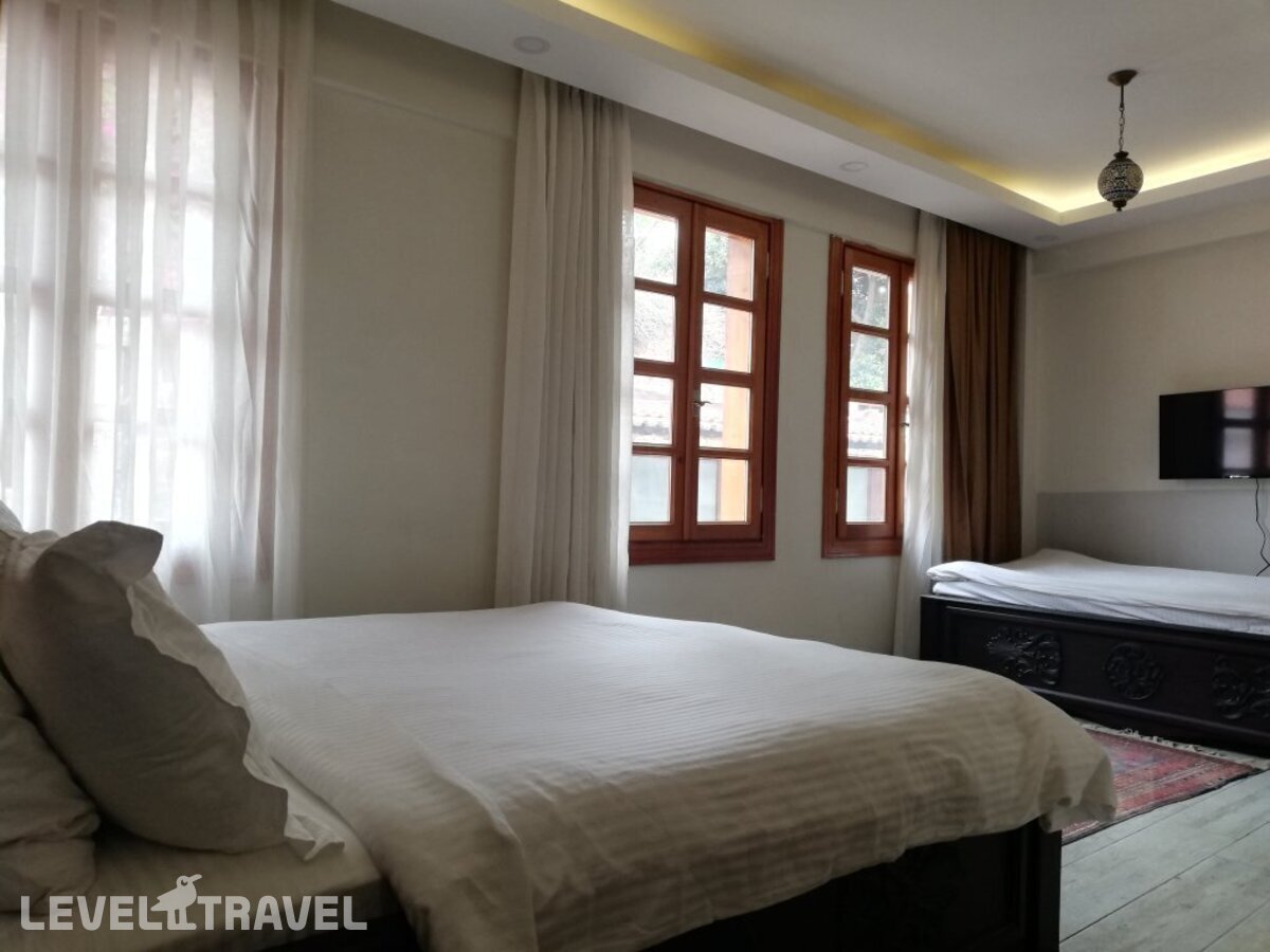 фотографии номера Трехместный номер отеля Woo Town Suites Hotel (Ex. Sanctakana Boutique Hotel & Spa Boutique) в Турция(Калеичи) - фото №1