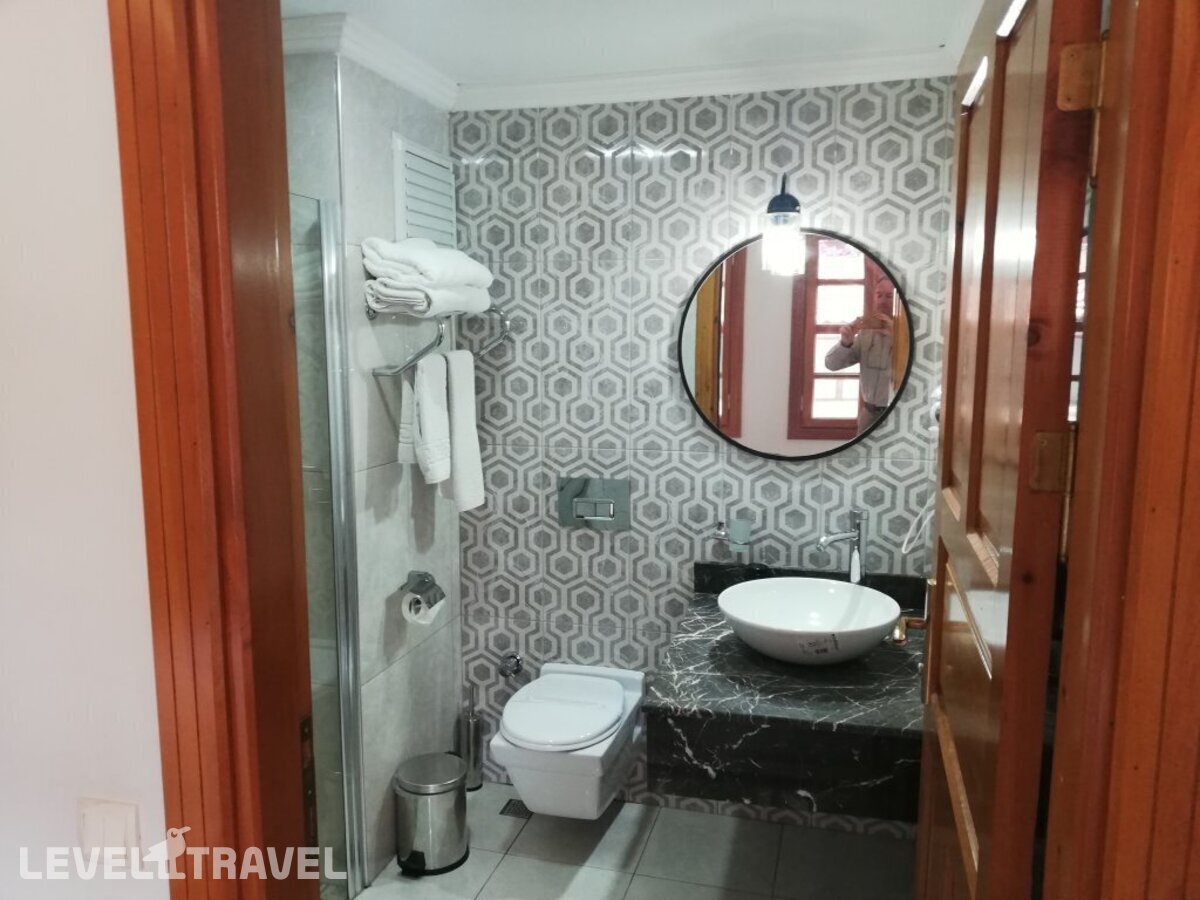 фотографии номера Трехместный номер отеля Woo Town Suites Hotel (Ex. Sanctakana Boutique Hotel & Spa Boutique) в Турция(Калеичи) - фото №3