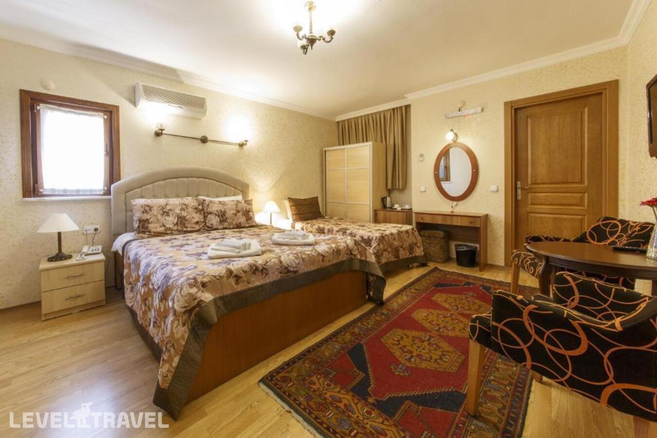 фотографии номера Трехместный номер отеля Ipekyolu Hotel в Турция(Султанахмет) - фото №8