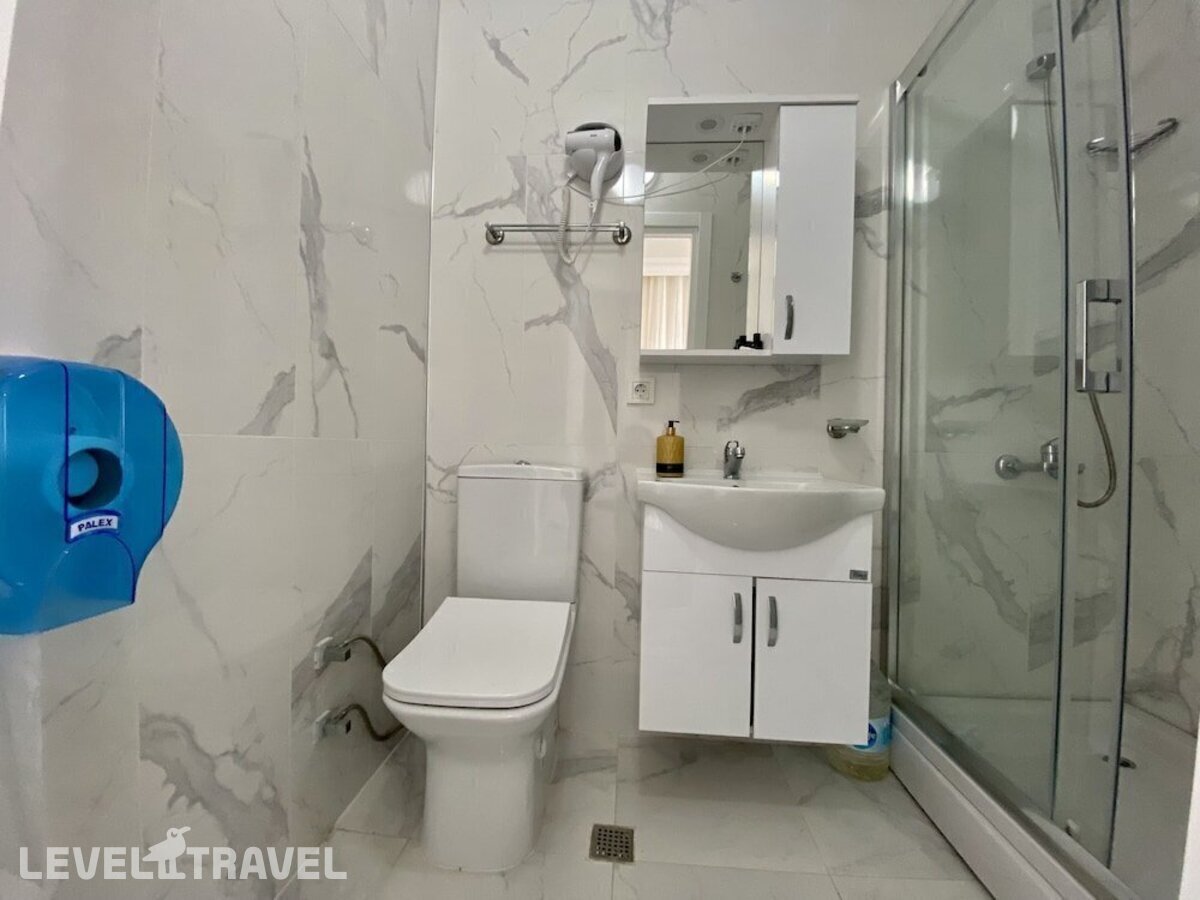 фотографии номера Стандартный номер отеля Doga Villa Guesthouse в Турция(Бююкчекмедже) - фото №10