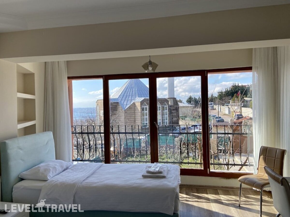 фотографии номера Стандартный номер отеля Doga Villa Guesthouse в Турция(Бююкчекмедже) - фото №8