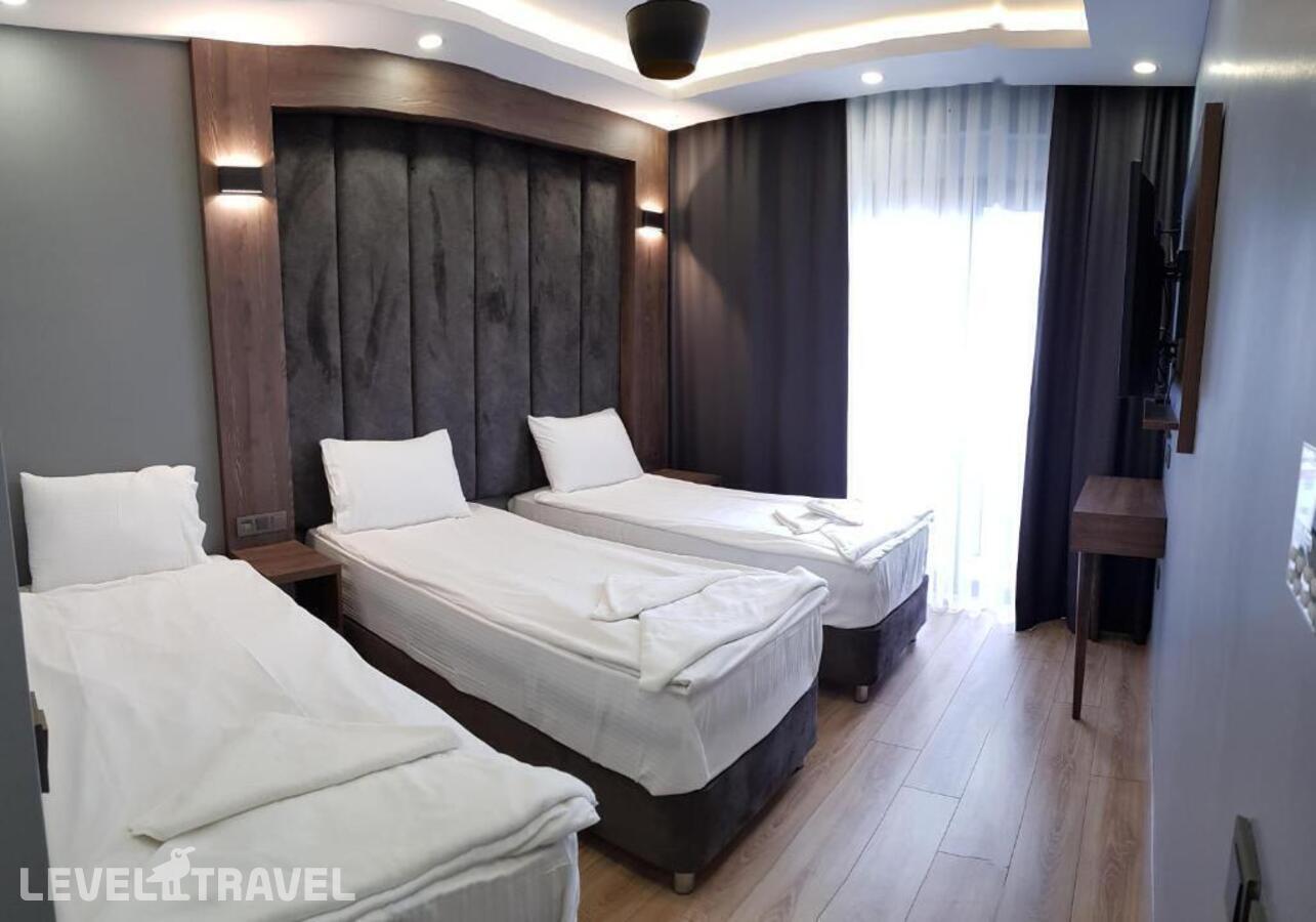 фотографии номера Трехместный номер отеля Basilissis Hotel в Турция(Фатих) - фото №1