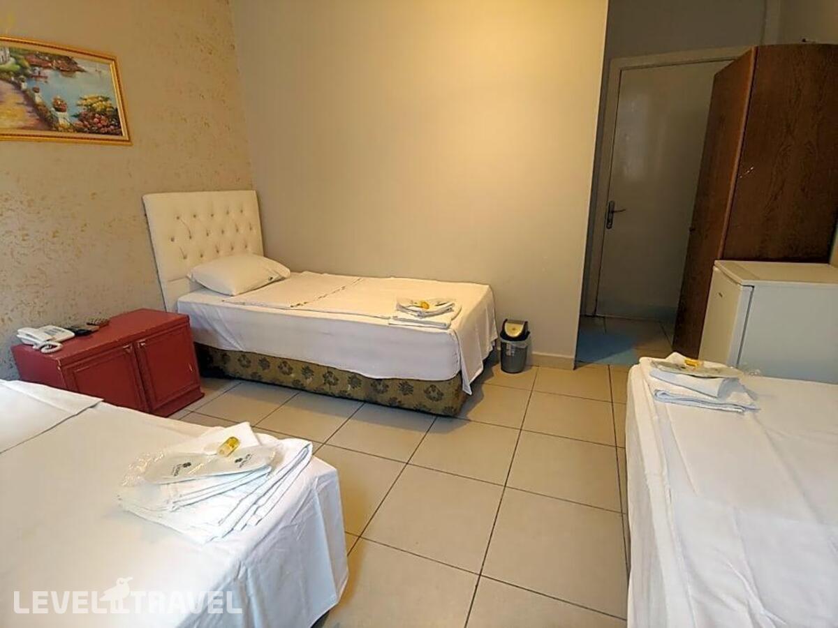 фотографии номера Трехместный номер отеля Hotel Yonca в Турция(Таксим) - фото №2