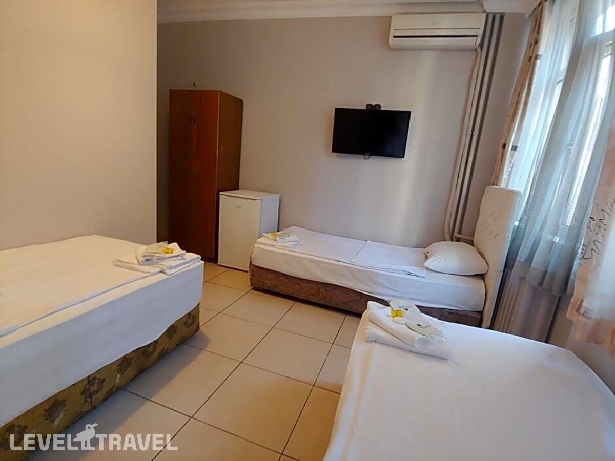 фотографии номера Трехместный номер отеля Hotel Yonca в Турция(Таксим) - фото №3