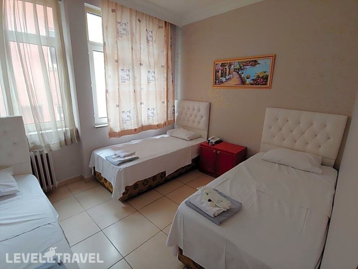 фотографии номера Трехместный номер отеля Hotel Yonca в Турция(Таксим) - фото №4