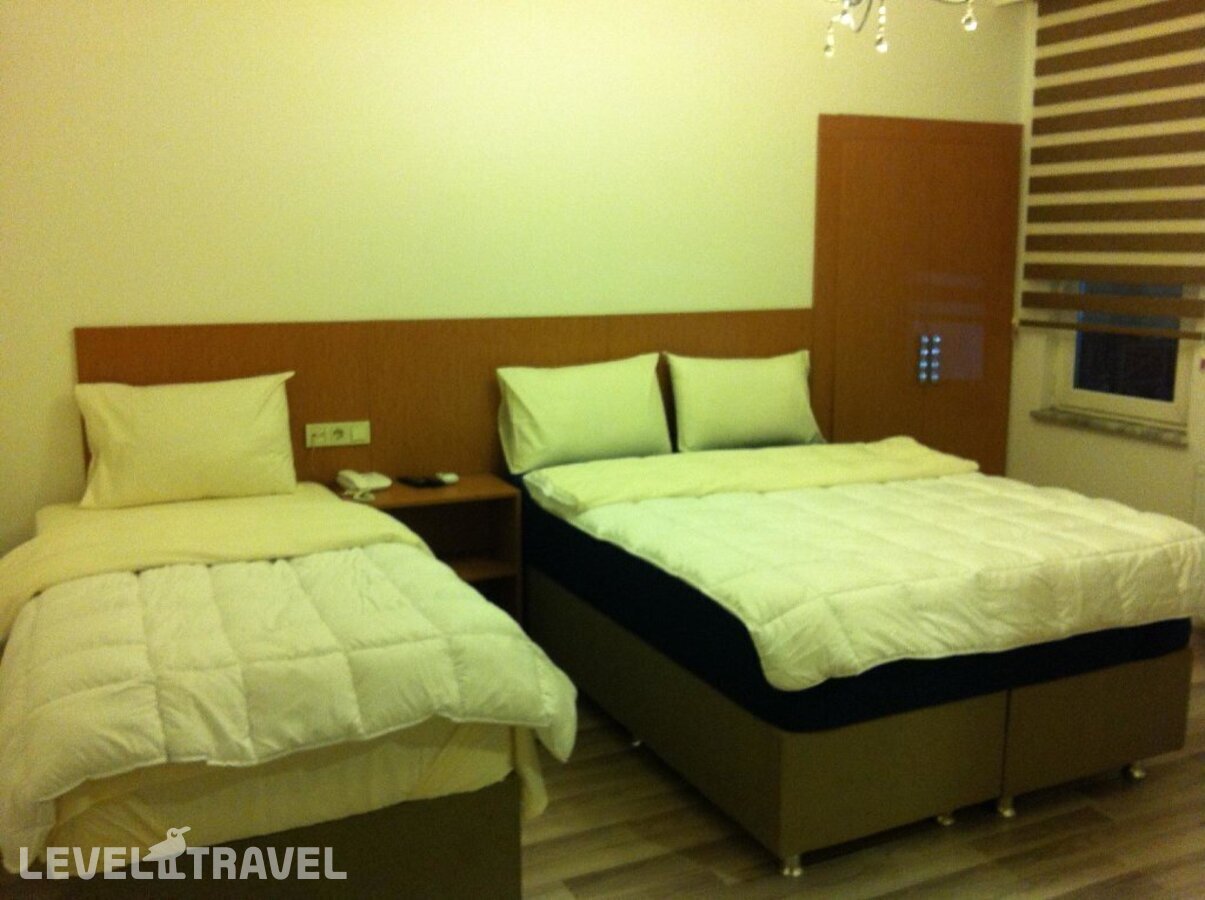 фотографии номера Семейный делюкс отеля Hotel Yonca в Турция(Таксим) - фото №1
