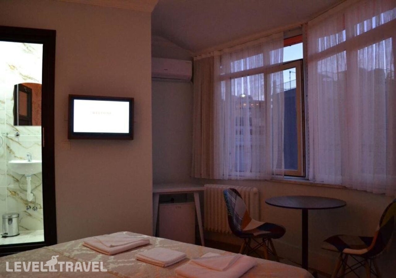 фотографии номера Улучшенный номер отеля Yeni Hotel в Турция(Сиркеджи) - фото №5