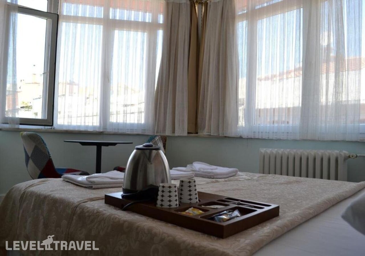 фотографии номера Улучшенный номер отеля Yeni Hotel в Турция(Сиркеджи) - фото №2