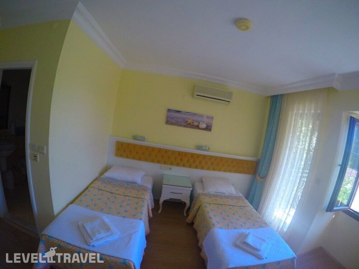 фотографии номера Стандартный номер отеля Ilkiz Beach Hotel в Турция(Олюдениз) - фото №4