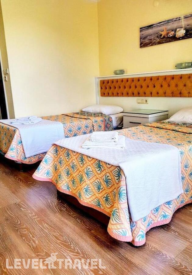 фотографии номера Стандартный номер отеля Ilkiz Beach Hotel в Турция(Олюдениз) - фото №9