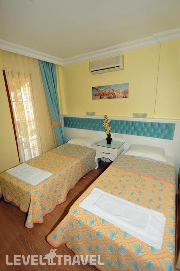фотографии номера Стандартный номер отеля Ilkiz Beach Hotel в Турция(Олюдениз) - фото №14